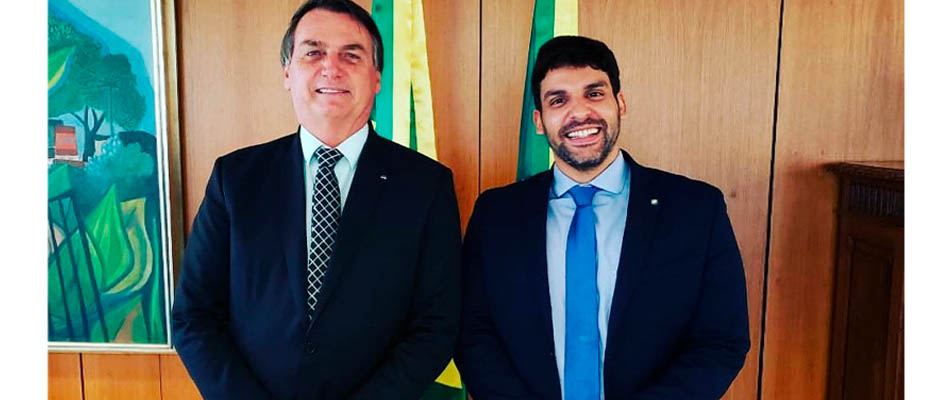 El presidente Bolsonaro y el secretario de cultura, André Porciuncula,Jair Bolsonaro